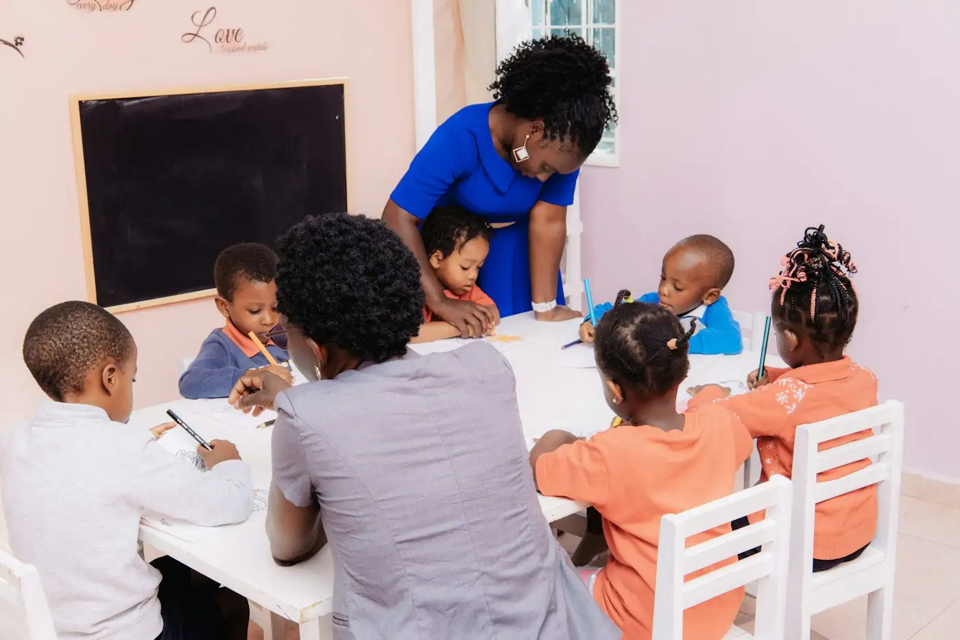 Children working with a guide